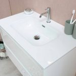 Bathroom Organization - white ceramic sink with stainless steel faucet