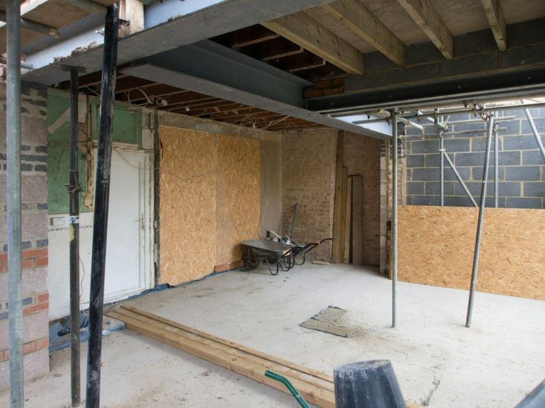 Basement Conversion - black and gray motorcycle near brown wall