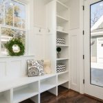 Mudroom Design - gray and white floral throw pillow beside rack inside room