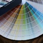 Color Swatches - black remote control on brown wooden round table