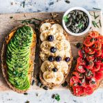 Vegan Food - assorted fruits and vegetable on brown wooden chopping board