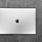 Electronics Recycling - silver macbook on brown textile