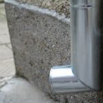 Clean Gutters - a close up of a metal object on a wall