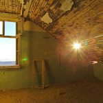 Leaky Roof - white wooden framed glass window