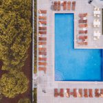 Clean Pool - bird'eye-view photography of swimming pool near trees