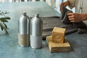 Natural Cleaners - a couple of metal containers with metal objects on a table