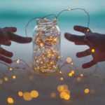 Mason Jar Lights - bokeh photography of lighted string lights inside Mason jar