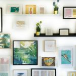 Gallery Wall - assorted-color framed paintings on the wall