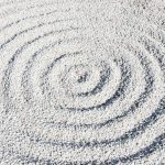 Zen Garden - a circular design made of sand on a beach