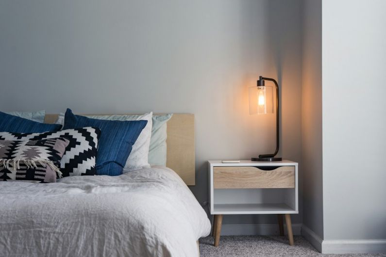 Smart Bedroom - black table lamp on nightstand