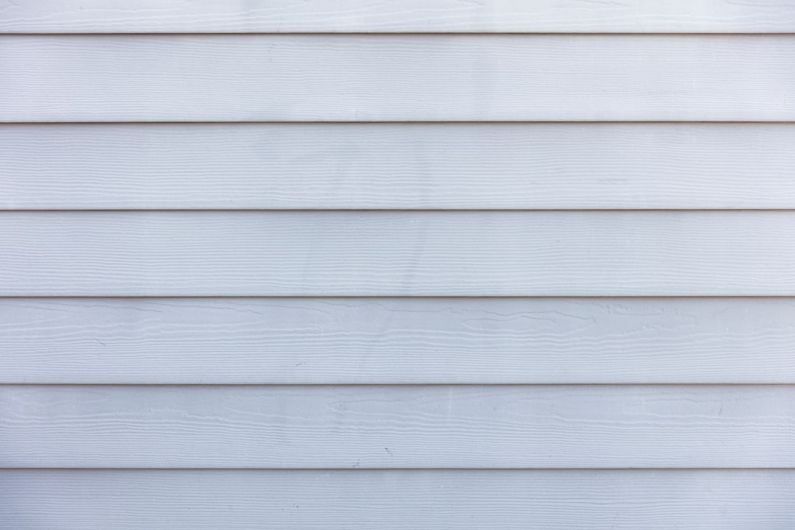 Siding - white wooden wall during daytime