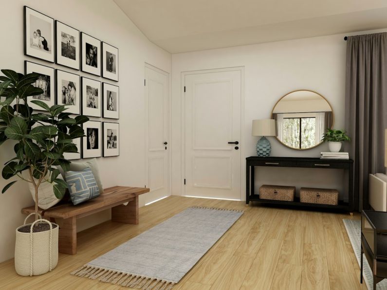 Entryway - brown wooden coffee table near white wooden door