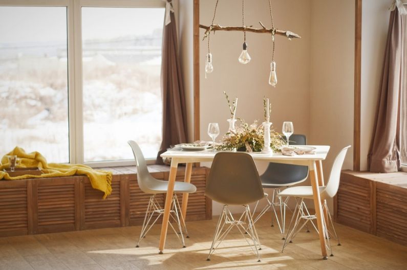 Window Home - white wooden dining table set during daytime